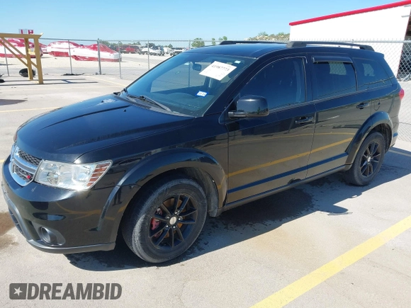 2015 Dodge Journey SXT with VIN 3C4PDCBG0FT595359, listed as a IAAI auction lot 41987773 with 135,528 mi miles. Bid and sale history available at carsss.com. Image 2.