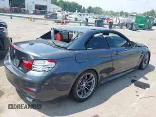 2015 BMW M4 with VIN WBS3U9C5XFJ967725, listed as a IAAI auction lot 42593444 with Not provided miles and . Bid and sale history available at DreamBid. Image 4.