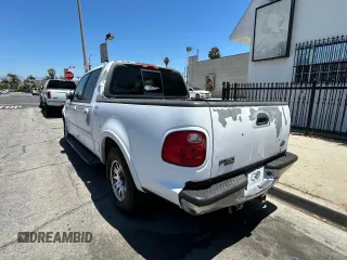 2001 Ford F-150 XLT с VIN 1FTRW07L11KF90642, выставлен на аукционе Copart как лот 64489205 с пробегом 242 959 миль миль и Списание • Salvage title. История ставок и продаж доступна на DreamBid. Изображение 3.