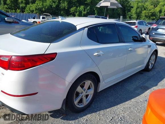 2015 Kia Optima LX with VIN 5XXGM4A70FG472650, listed as a IAAI auction lot 42698013 with 213,713 mi miles and . Bid and sale history available at DreamBid. Image 4.