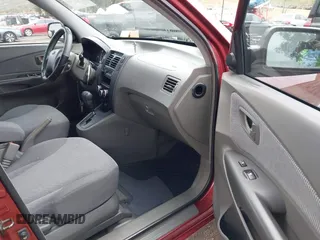 2006 Hyundai Tucson GL with VIN KM8JM12BX6U431424, listed as a IAAI auction lot 41769787 with 125,218 mi miles. Bid and sale history available at carsss.com. Image 5.