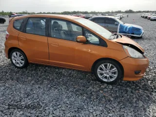 2011 Honda Fit Sport with VIN JHMGE8H59BC007883, listed as a Copart auction lot 54194635 with 123,256 mi miles and Salvage Title. Bid and sale history available at DreamBid. Image 4.
