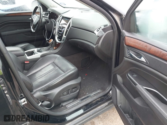 2016 Cadillac SRX Luxury Collection z VIN 3GYFNBE32GS577023, wystawiony jako IAAI lot #42374130 z przebiegiem 132 671 mil mil oraz . Historia ofert i sprzedaży dostępna na DreamBid. Obrazek 5.