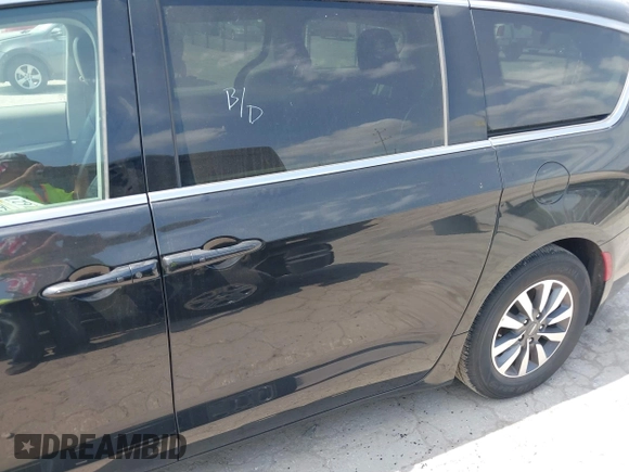 2023 Chrysler Pacifica Hybrid Touring L with VIN 2C4RC1L75PR592251, listed as a IAAI auction lot 42037873 with 44,428 mi miles and . Bid and sale history available at DreamBid. Image 14.