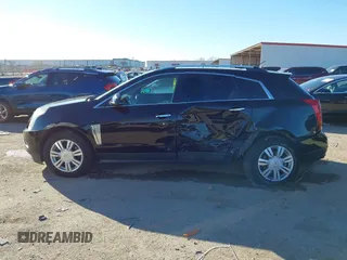 2016 Cadillac SRX Luxury Collection with VIN 3GYFNEE39GS583306, listed as a IAAI auction lot 41312161 with 98,831 mi miles. Bid and sale history available at carsss.com. Image 14.