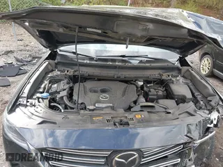 2021 Mazda CX-9 Carbon Edition with VIN JM3TCADY4M0517535, listed as a IAAI auction lot 41821261 with 60,053 mi miles. Bid and sale history available at carsss.com. Image 10.