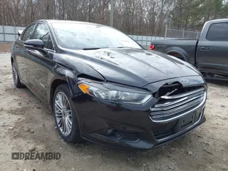 2014 Ford Fusion SE Hybrid with VIN 3FA6P0LU2ER133294, listed as a IAAI auction lot 41696064 with 150,537 mi miles. Bid and sale history available at carsss.com. Image 6.