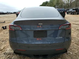 2023 Tesla Model Y Long Range z VIN 7SAYGDEE5PA164270, wystawiony jako Copart lot #50260835 z przebiegiem 17 340 mil mil oraz Szkoda całkowita • Salvage title. Historia ofert i sprzedaży dostępna na DreamBid. Obrazek 6.