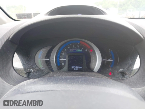 2010 Honda Insight LX with VIN JHMZE2H57AS008203, listed as a IAAI auction lot 42240869 with 150,562 mi miles and . Bid and sale history available at DreamBid. Image 7.