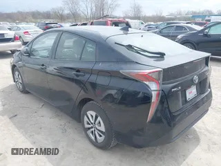 2017 Toyota Prius Two with VIN JTDKARFUXH3041931, listed as a IAAI auction lot 42075004 with 75,768 mi miles and . Bid and sale history available at DreamBid. Image 3.