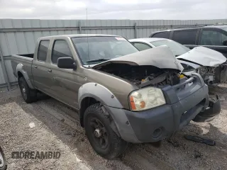 2002 Nissan Frontier XE z VIN 1N6ED29X92C367175, wystawiony jako Copart lot #54979685 z przebiegiem 281 470 mil mil oraz Szkoda całkowita • Salvage title. Historia ofert i sprzedaży dostępna na DreamBid. Obrazek 4.