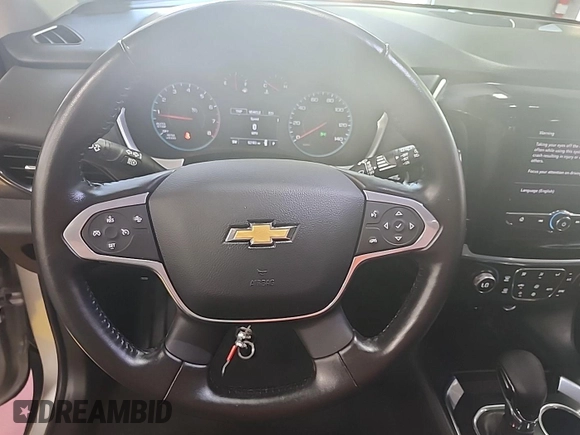 2021 Chevrolet Traverse LT Cloth with VIN 1GNEVMKWXMJ220477, listed as a IAAI auction lot 42842579 with 62,180 mi miles and . Bid and sale history available at DreamBid. Image 8.