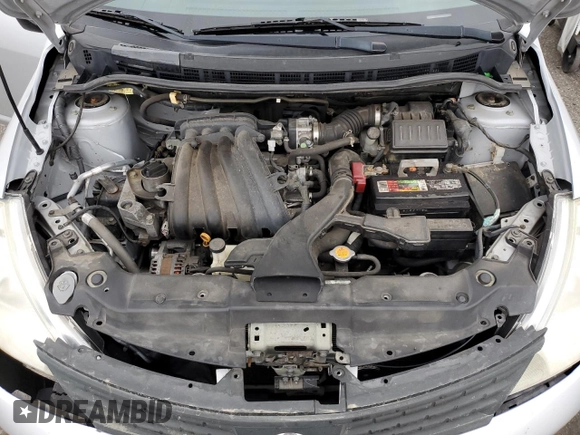 2009 Nissan Versa 1.6 with VIN 3N1CC11E79L429613, listed as a Copart auction lot 72220034 with 134,891 mi miles and Salvage Title. Bid and sale history available at carsss.com. Image 11.