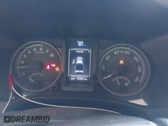 2016 Toyota Tacoma SR with VIN 5TFCZ5AN8GX020900, listed as a IAAI auction lot 41911329 with 133,931 mi miles. Bid and sale history available at carsss.com. Image 7.