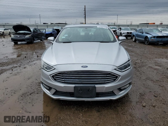 2017 Ford Fusion SE with VIN 3FA6P0HDXHR124355, listed as a Copart auction lot 51341715 with 99,984 mi miles and Salvage Title. Bid and sale history available at DreamBid. Image 5.