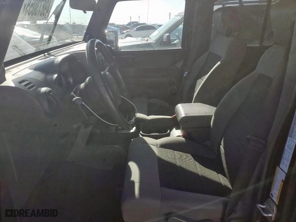 2010 Jeep Wrangler Unlimited Sport with VIN 1J4BA3H1XAL164225, listed as a Copart auction lot 49873055 with 75,665 mi miles and Salvage Title. Bid and sale history available at carsss.com. Image 7.