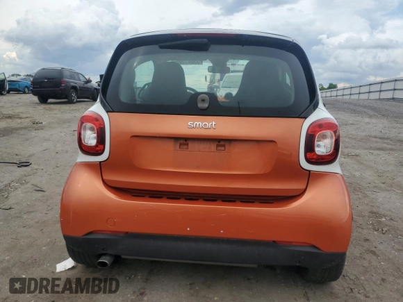 2016 Smart fortwo Passion with VIN WMEFJ5DA0GK060576, listed as a Copart auction lot 55641565 with 99,558 mi miles and Salvage title. Bid and sale history available at DreamBid. Image 6.