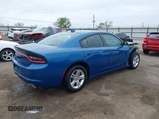 2023 Dodge Charger SXT with VIN 2C3CDXBGXPH674476, listed as a IAAI auction lot 41910339 with 14,079 mi miles. Bid and sale history available at carsss.com. Image 4.