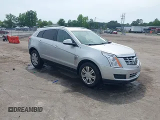 2016 Cadillac SRX Luxury Collection z VIN 3GYFNBE35GS581163, wystawiony jako IAAI lot #42275493 z przebiegiem 171 697 mil mil oraz . Historia ofert i sprzedaży dostępna na DreamBid. Obrazek 1.