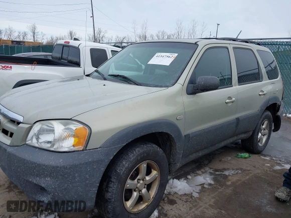 2005 Mazda Tribute i with VIN 4F2YZ02Z35KM57658, listed as a IAAI auction lot 41547562 with 131,303 mi miles and . Bid and sale history available at carsss.com. Image 2.