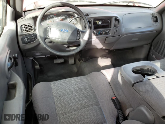 2003 Ford F-150 XL with VIN 1FTRX07213KB93777, listed as a Copart auction lot 46950285 with 176,332 mi miles and Salvage title. Bid and sale history available at DreamBid. Image 8.