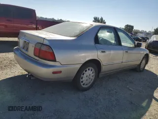 1997 Honda Accord EX with VIN 1HGCD5667VA025961, listed as a Copart auction lot 72125824 with 242,047 mi miles and Salvage Title. Bid and sale history available at carsss.com. Image 3.