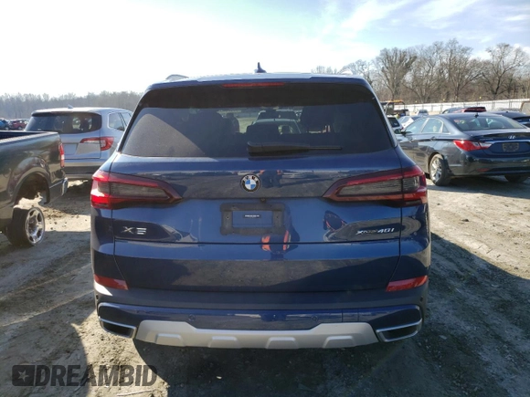 2021 BMW X5 xDrive40i with VIN 5UXCR6C02M9G43082, listed as a Copart auction lot 36675453 with 23,876 mi miles. Bid and sale history available at carsss.com. Image 6.