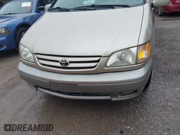 2001 Toyota Sienna LE with VIN 4T3ZF13CX1U367504, listed as a IAAI auction lot 42111583 with 302,801 mi miles and . Bid and sale history available at DreamBid. Image 6.