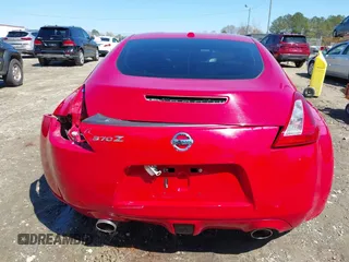 2009 Nissan 370Z Touring with VIN JN1AZ44E69M405179, listed as a IAAI auction lot 41762303 with 132,853 mi miles and . Bid and sale history available at DreamBid. Image 17.