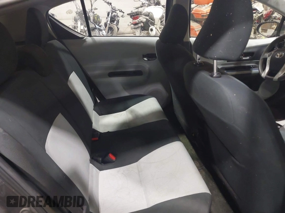 2012 Toyota Prius One z VIN JTDKDTB36C1508025, wystawiony jako IAAI lot #41983947 z przebiegiem 180 357 mil mil oraz . Historia ofert i sprzedaży dostępna na DreamBid. Obrazek 8.