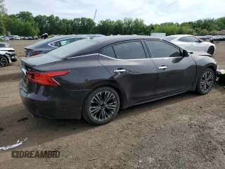 2016 Nissan Maxima SR with VIN 1N4AA6AP9GC447540, listed as a Copart auction lot 60861815 with 127,420 mi miles and Salvage title. Bid and sale history available at DreamBid. Image 3.