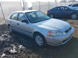 1997 Honda Civic LX z VIN JHMEJ6675VS032978, wystawiony jako IAAI lot #41705231 z przebiegiem 59 315 mil mil oraz . Historia ofert i sprzedaży dostępna na DreamBid. Obrazek 1.