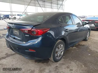 2016 Mazda Mazda3 i Sport with VIN 3MZBM1T7XGM252659, listed as a IAAI auction lot 41465038 with 151,045 mi miles. Bid and sale history available at carsss.com. Image 4.