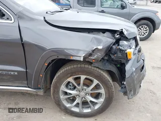 2020 Jeep Grand Cherokee Summit with VIN 1C4RJFJT2LC408499, listed as a IAAI auction lot 41854021 with 78,189 mi miles and . Bid and sale history available at DreamBid. Image 18.