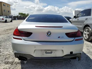 2013 BMW 6 Series 650i with VIN WBAYM9C59DDW20408, listed as a Copart auction lot 73585214 with 143,605 mi miles and Clean Title. Bid and sale history available at carsss.com. Image 6.