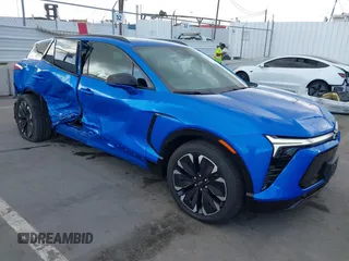 2024 Chevrolet Blazer EV eAWD RS z VIN 3GNKDCRJ7RS186546, wystawiony jako IAAI lot #41919411 z przebiegiem 5282 mil mil oraz . Historia ofert i sprzedaży dostępna na DreamBid. Obrazek 1.