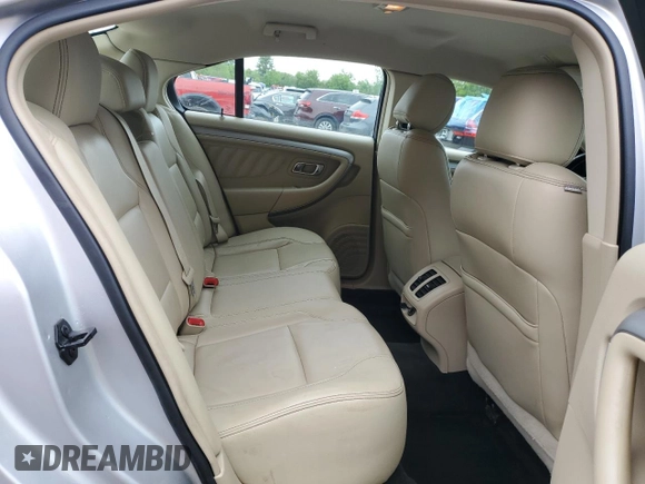 2017 Ford Taurus SEL z VIN 1FAHP2E87HG119780, wystawiony jako Copart lot #59135705 z przebiegiem 122 731 mil mil oraz Szkoda całkowita • Salvage title. Historia ofert i sprzedaży dostępna na DreamBid. Obrazek 10.