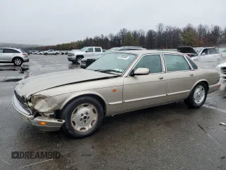 1995 Jaguar XJ with VIN SAJHX1743SC720991, listed as a Copart auction lot 43586965 with 138,504 mi miles and Salvage title. Bid and sale history available at DreamBid. Image 1.