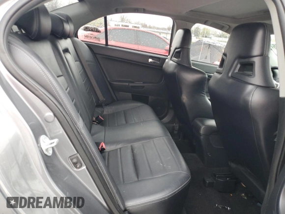 2012 Mitsubishi Lancer Evolution MR z VIN JA32W5FV5CU013118, wystawiony jako Copart lot #51825555 z przebiegiem 119 651 mil mil oraz Czysty tytuł • Clean title. Historia ofert i sprzedaży dostępna na DreamBid. Obrazek 10.