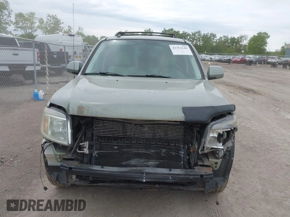 2008 Mercury Mariner Premier z VIN 4M2CU97198KJ41566, wystawiony jako IAAI lot #42311149 z przebiegiem 155 294 mil mil oraz . Historia ofert i sprzedaży dostępna na DreamBid. Obrazek 13.