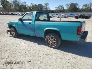 1996 Dodge Dakota with VIN 1B7FL26X9TW706385, listed as a Copart auction lot 77003174 with 146,228 mi miles and Salvage Title. Bid and sale history available at carsss.com. Image 2.
