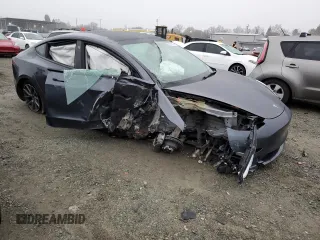 2023 Tesla Model 3 with VIN 5YJ3E1EA4PF426968, listed as a Copart auction lot 85933574 with Not Provided miles and Salvage Title. Bid and sale history available at DreamBid. Image 4.