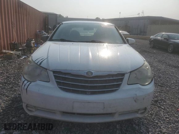 2008 Chrysler Sebring LX z VIN 1C3LC46K48N167789, wystawiony jako Copart lot #57791965 z przebiegiem 152 080 mil mil oraz Szkoda całkowita • Salvage title. Historia ofert i sprzedaży dostępna na DreamBid. Obrazek 5.