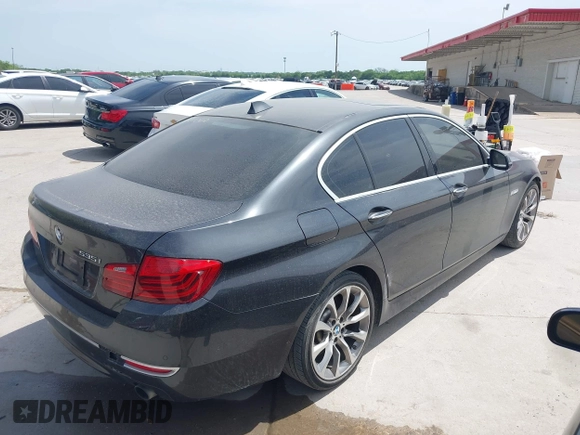 2014 BMW 5 Series 535i with VIN WBA5B1C51ED475795, listed as a IAAI auction lot 42028184 with 119,692 mi miles. Bid and sale history available at carsss.com. Image 4.