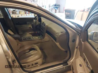 2004 Lincoln LS w/Luxury Pkg with VIN 1LNHM86S24Y685894, listed as a IAAI auction lot 42011467 with 148,427 mi miles. Bid and sale history available at carsss.com. Image 5.