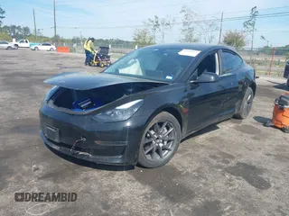 2023 Tesla Model 3 with VIN 5YJ3E1EA3PF681515, listed as a IAAI auction lot 41899053 with 15,985 mi miles and . Bid and sale history available at carsss.com. Image 17.
