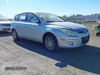 2009 Hyundai Elantra Touring z VIN KMHDC86E99U033025, wystawiony jako IAAI lot #42301392 z przebiegiem 154 455 mil mil oraz . Historia ofert i sprzedaży dostępna na DreamBid. Obrazek 1.