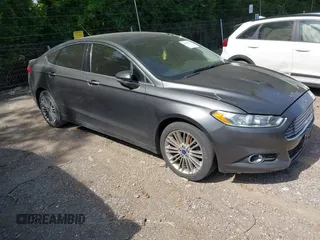 2015 Ford Fusion SE z VIN 3FA6P0H98FR275848, wystawiony jako IAAI lot #42311852 z przebiegiem 197 536 mil mil oraz . Historia ofert i sprzedaży dostępna na DreamBid. Obrazek 1.