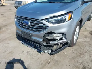 2022 Ford Edge SEL z VIN 2FMPK4J91NBA64868, wystawiony jako IAAI lot #38954615 z przebiegiem 33 911 mil mil oraz . Historia ofert i sprzedaży dostępna na DreamBid. Obrazek 6.