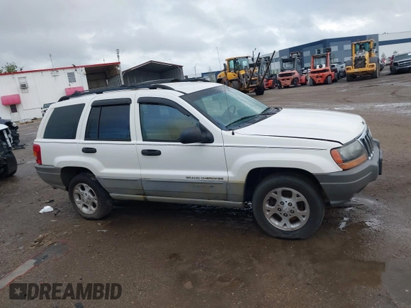 2000 Jeep Grand Cherokee Laredo z VIN 1J4G248S2YC339997, wystawiony jako IAAI lot #42395079 z przebiegiem 261 704 mil mil oraz . Historia ofert i sprzedaży dostępna na DreamBid. Obrazek 13.